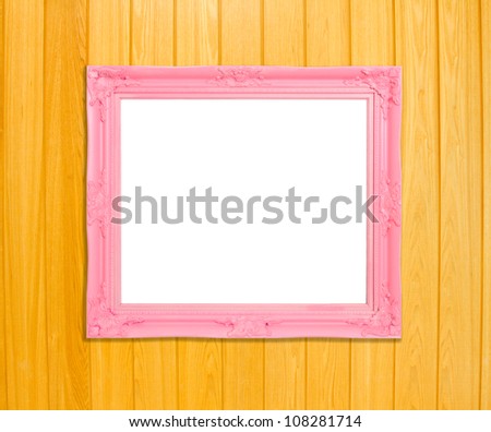Pink Vintage picture frame, wood plated, blue wood background, clipping path included