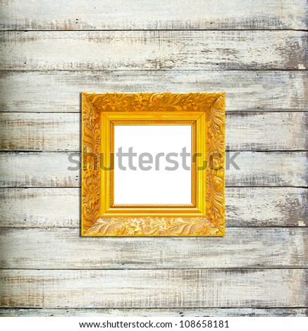 Gold Vintage picture frame, wood plated, old wood background, clipping path included