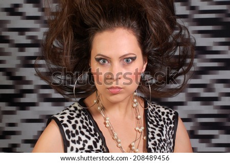 Portrait about woman with black and white design on black and white background.