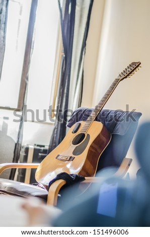 student room with guitar