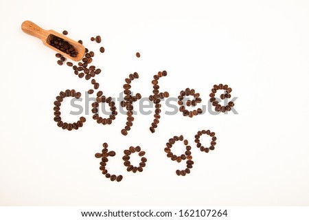 coffee to go sign made of coffee beans on white background