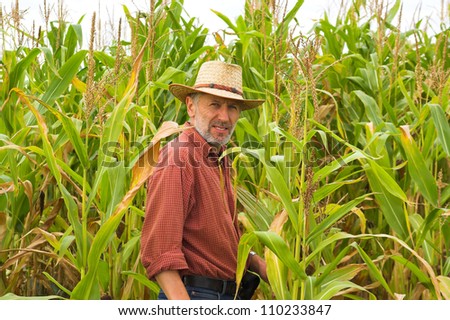 Farmer on the field of maize