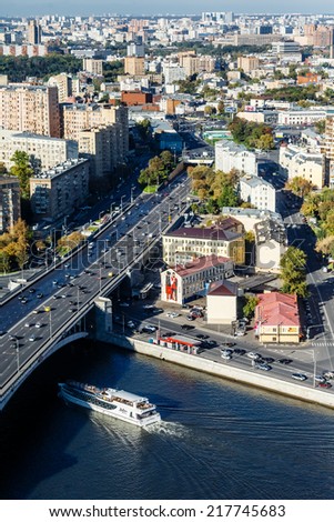 RUSSIA, MOSCOW- SEP 15: Top view of the city. Working quarters, the ship floating under the bridge, September 15, 2014