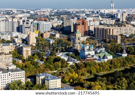 RUSSIA, MOSCOW- SEP 15: Top view of the city. Lonely church among residential quarters, September 15, 2014