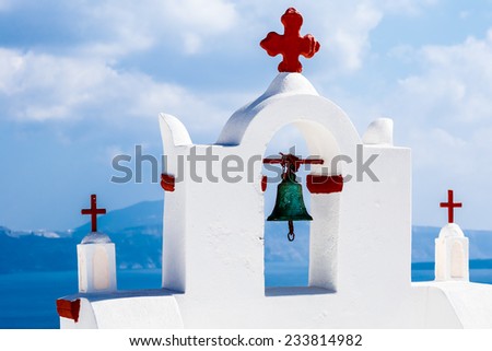 The greek church in the Oia village, sea view, Greece
