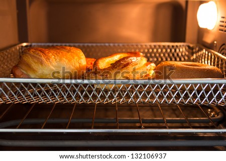 Bakery on tray in oven
