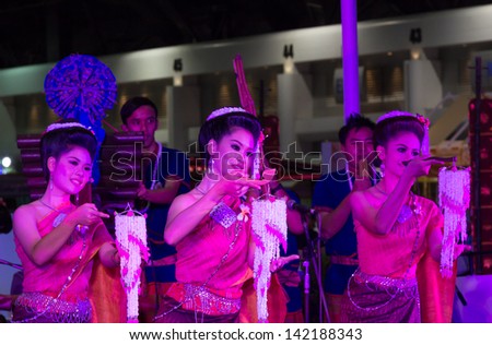 BANGKOK, THAILAND - JUNE 9: Women dance Thailand northeast culture style event Thailand Tourism Festival, 2013 at Bangkok, Thailand