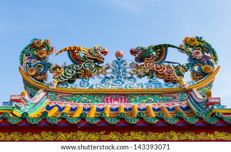 SUPHANBURI, THAILAND-JUNE 16: The roof of Chinese style, Architecture of Chinese style in The Dragon Nation Park on June 16, 2013 in Suphanburi, Thailand