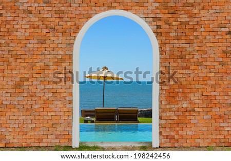 Sea view inside on the brick wall