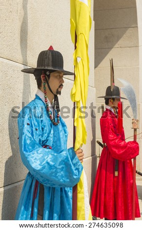 Korean soldier costume vintage around Gyeongbokgung palace  Seoul, South Korea - April 11, 2015: Koreans in Traditional Costumes on duty of the Royal Guard Ceremony at Gyeongbokgung Palace