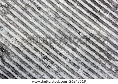 abstract background of diagonal lines in a frozen track