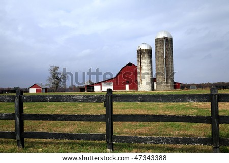 Iconic Barn  and Silo with weathered fence