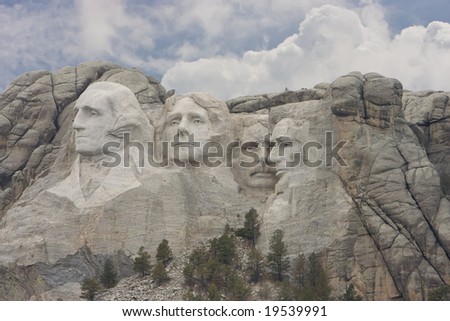 Daytime shot of Mount Rushmore with the presidents heads.
