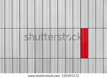 Gray outside wall with a red rectangle