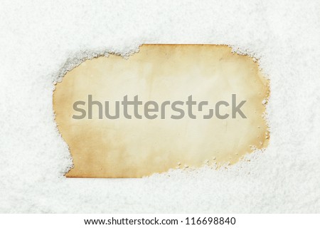 Old paper covered in snow