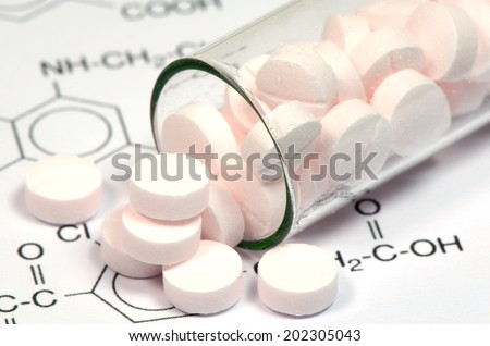 Chemical Structure and Pink tablets of Certain Kind of Medicine in New Drug Discovery Concept and Pharmaceutical Technology.