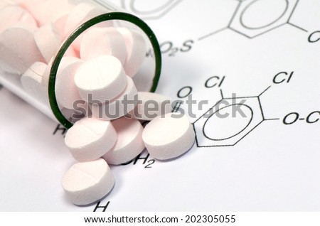 Chemical Structure and Pink tablets of Certain Kind of Medicine in New Drug Discovery Concept and Pharmaceutical Technology.