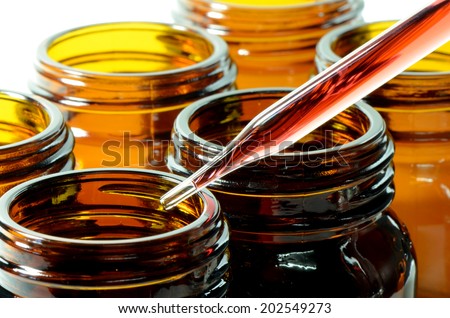 Amber Bottle and Dropper in Laboratory Testing for New Drug or New Substance Development.