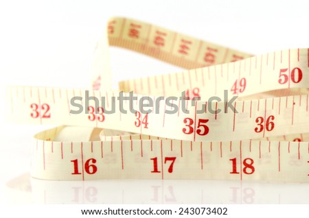 Tape Measure on White Background in Waistline and Weight Control Concept.