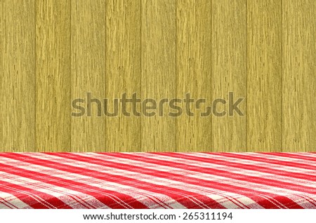 Wood Kitchen Shelf Displayed with Red Table Cloth.