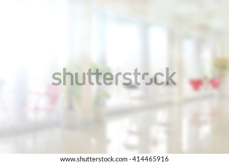 Blur white living room background with warm light.