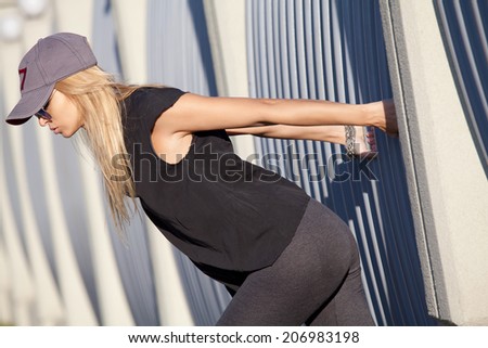Pretty woman with long hair engaged in physical activity