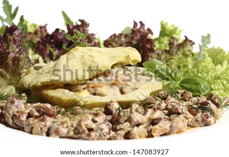 stuffed patty pan with minced meat, served with vegetables and  mushroom sauce