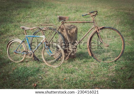 Antique or retro rusty bicycles outside