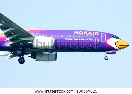 CHIANGMAI ,  THAILAND Ã¢Â?Â? DECEMBER  31  2011: HS-DBB  Boeing 737-800 of NokAir  ( Low-cost Airline ), Landing to Chiangmai airport  from Bangkok  Don Muang Airport.