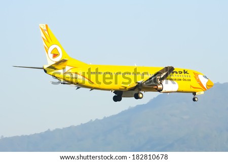 CHIANGMAI , THAILAND- APRIL 21 2007: HS-DDH Boeing 737-400 of NokAir airline ( Low-cost Airline), Landing to Chiangmai airport from Bangkok Don Muang Airport, thailand.