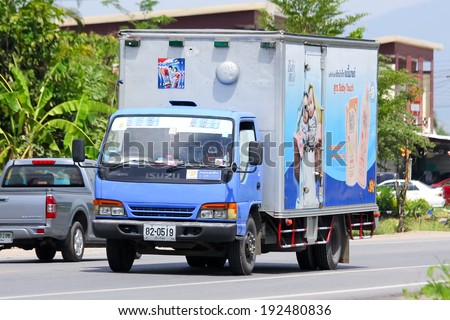 CHIANGMAI, THAILAND- MAY 9  2014: Cargo Truck of Osotspa company. Photo at road no.121 about 8 km from downtown Chiangmai, thailand.