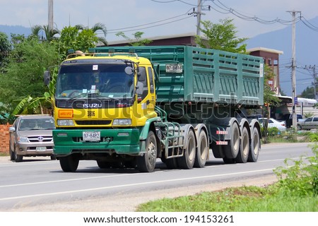 CHIANGMAI, THAILAND - MAY 9 2014 : Trailer dump truck of stone one public company limited. Photo at road no.121 about 8 km from downtown Chiangmai, thailand.