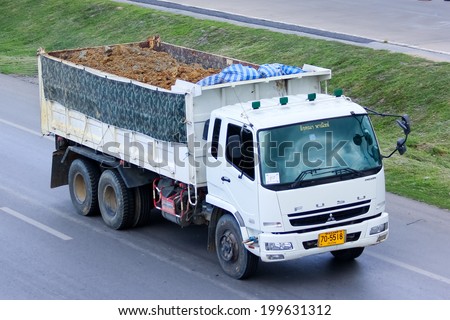 CHIANGMAI, THAILAND - MAY 21 2014:  Dump truck of Akana commerce company. Photo at Road No.11 about 5 Km from Chiangmai city.
