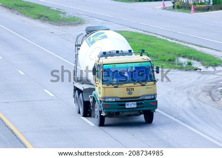 CHIANGMAI, THAILAND - JULY 18 2001: Cement truck of QMIX  Concrete product company. Photo at road no.11 about 5 km from downtown Chiangmai, thailand.