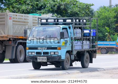 CHIANGMAI, THAILAND - AUGUST 15 2014 : Drinking water delivery truck of Rinphet company. Photo at road no 121 about 8 km from downtown Chiangmai, thailand.