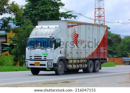 CHIANGMAI , THAILAND - SEPTEMBER 4 2014:   Somchai logistic  truck. Photo at road no 121 about 8 km from downtown Chiangmai, thailand.