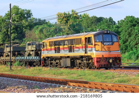 CHIANGMAI , THAILAND - September 10 2014: Ge Diesel locomotive no.4019 and truck Soldier. From chiangmai. Photo at Chiangmai railway station.