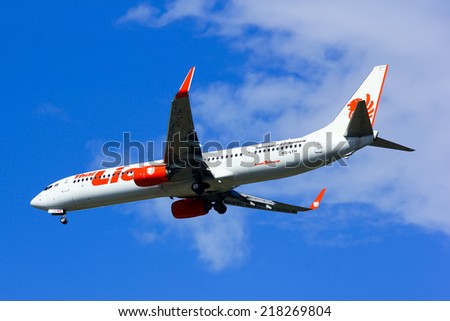CHIANGMAI , THAILAND - SEPTEMBER 10 2014: HS-LTH Boeing 737-900ER of Thai lion air airline , landing to Chiangmai airport from Bangkok Don Muang Airport, thailand.