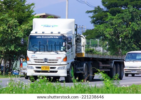 Chiangmai, Thailand - October 3, 2014: Trailer Truck of Tangheng Service transport company. Photo at road no.121 about 8 km from downtown Chiangmai, thailand.