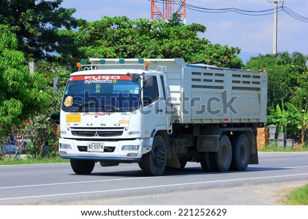 Chiangmai, Thailand - October 3, 2014: Dump truck of Payawan company. Photo at road no 121 about 8 km from downtown Chiangmai, thailand.