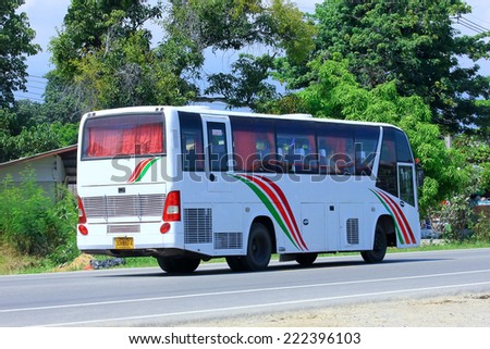 CHIANGMAI, THAILAND - OCTOBER 3 2014: Private bus for group travel. Photo at road no.121 about 8 km from downtown Chiangmai, thailand.