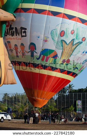 CHIANGMAI, THAILAND -JANUARY 21 2012: An unidentified  hot air balloon, Paint of Taitung ( taiwan ) travel. Photo in Chiangmai balloon festival, Chiangmai. Thailand.