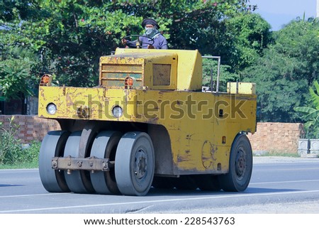 CHIANGMAI, THAILAND -NOVEMBER 1 2014: An unidentified Sakao Tire roller. Sakai is Heavy Industries of Japan. Photo at road no.121 about 8 km from downtown Chiangmai, thailand.