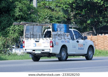CHIANGMAI , THAILAND -NOVEMBER 20 2014:   Mini truck of Triple T Broadband company. Intenet  Service in Thailand. Photo at road no 121 about 8 km from downtown Chiangmai, thailand.