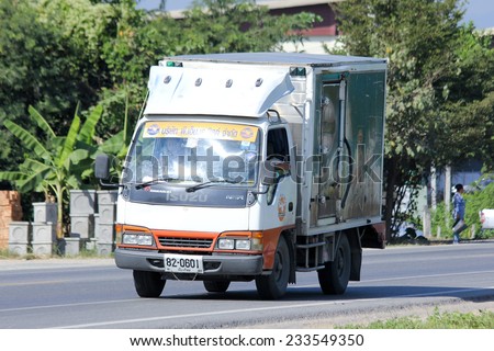 CHIANGMAI, THAILAND - NOVEMBER 24 2014: Refrigerated container mini truck of PNK milk product. Photo at road no 121 about 8 km from downtown Chiangmai, thailand.