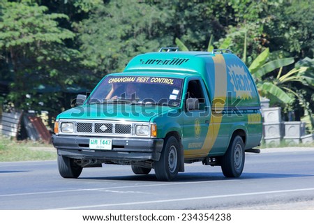 CHIANGMAI, THAILAND - NOVEMBER 27 2014: Mini truck of Chiangmai pest control company. Service for control pest in home and Building. Photo at road no 121 about 8 km from downtown Chiangmai, thailand.