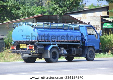 CHIANGMAI, THAILAND - OCTOBER 4 2014: Private of Sewage truck. Photo at road no.121 about 8 km from downtown Chiangmai, thailand.