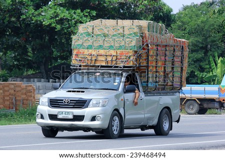 CHIANGMAI, THAILAND -OCTOBER 10 2014: Truck of Paiwan Transport company. Photo at road no.121 about 8 km from downtown Chiangmai, thailand.