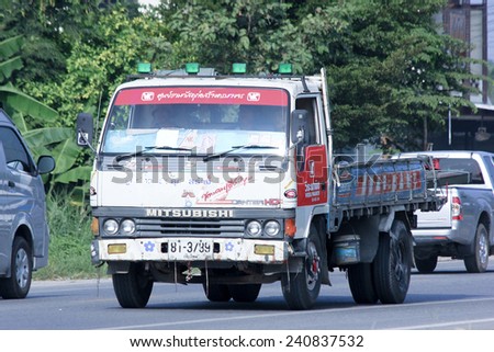 CHIANGMAI, THAILAND -OCTOBER 18 2014: Truck  of  Weera Phanich Company. Photo at road no.121 about 8 km from downtown Chiangmai, thailand.
