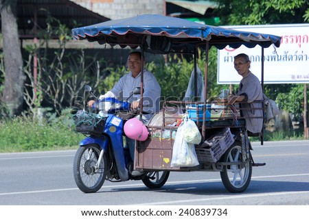 CHIANGMAI, THAILAND -OCTOBER 25 2014:  Private Motorcycle taxi. Service in Village. Photo at road no 121 about 8 km from downtown Chiangmai, thailand.